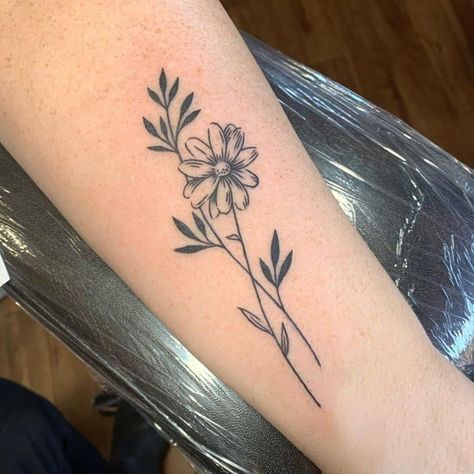 Top 107 Best Daisy Tattoos [2021 Inspiration Guide] Vine Tattoo With Sunflower, Daisy Memorial Tattoo Mom, Daisy And Gladiolus Tattoo, Daisy Tattoo For Men, Colored Daisy Tattoo, Daisy And Lily Tattoo, Shasta Daisy Tattoo, Daisy Tattoo Men, Daisy Tattoo Black And White