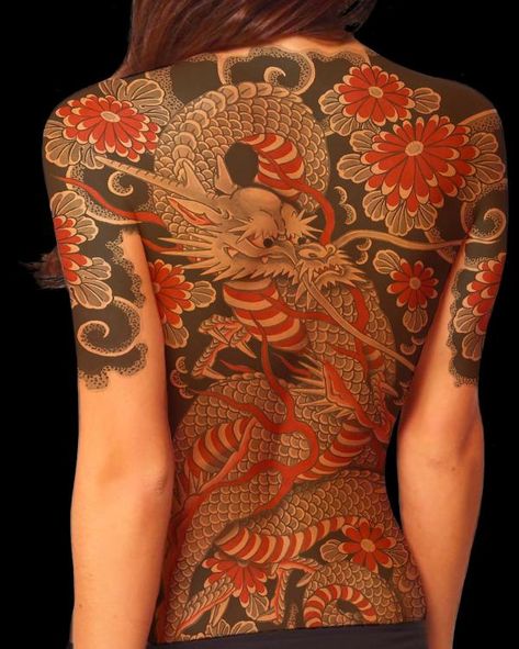 Japanese dragon and daisy back tattoo for females Japanese Back Dragon Tattoo, Half Back Japanese Tattoo, Female Japanese Back Tattoo, Traditional Japanese Tattoos Back, Traditional Dragon Back Tattoo, Japanese Tattoo Art Women, Traditional Japanese Back Tattoo, Back Tattoo Japanese, Dragon Irezumi