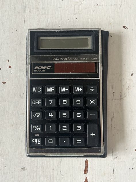 This vintage KMC 8000B calculator is a reliable and efficient tool for all your mathematical needs. It has been tested and confirmed to be in good working condition. Featuring an LCD display, regular key size, and handheld size, this basic calculator is perfect for office or personal use. It is manufactured in Taiwan and comes in its original state without any custom modifications. Purchase with confidence and simplify your math with the KMC 8000B calculator. Nice used condition Calculator Aesthetic, Old Calculator, Vintage Calculator, Office School, Calculator, School Supplies, Taiwan, 1960s, Ipad