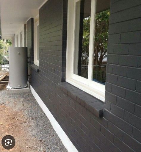 Dark Grey And Brick House Exterior, Black Brick House White Windows, Black And Grey Brick House, Charcoal Gray Brick House Exterior, Paint Brick Black Exterior, Black Brick House White Trim, Dark Painted Brick House Exterior, Dark Grey Painted Brick House, Dark Gray Painted Brick Exterior