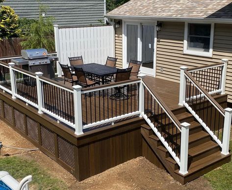 The Deck Guy | Talk about an upgrade! This gorgeous transformation features TREX Spiced Rum Decking with TREX Transcend classic white railing with black… | Instagram Trex Railing Ideas, Trex Deck Ideas Color Schemes, Trex Spiced Rum, Trex Deck Ideas, Diy Deck Decor, Trex Deck Railing, Trex Transcend Railing, Front Porch Railing Ideas, White Railing