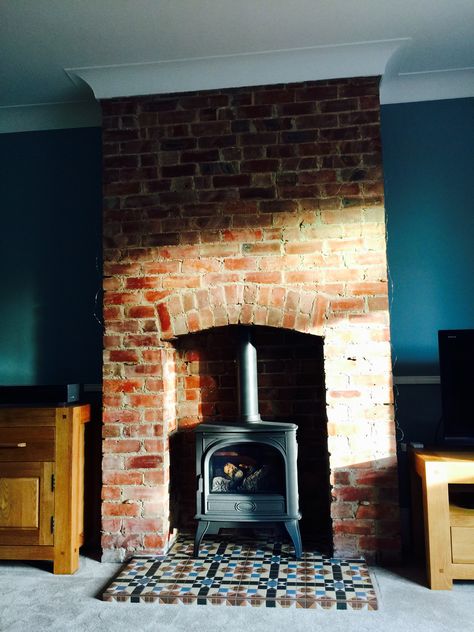 Open Brick Fireplace, Fireplace Red Brick, Brick Fireplace With Log Burner, Exposed Brick Fireplace, Brick Fireplace Victorian, Red Brick Inglenook Fireplace, Converted Firehouse, Exposed Brick Log Burner, Fire Stove With Brick Wallbehind