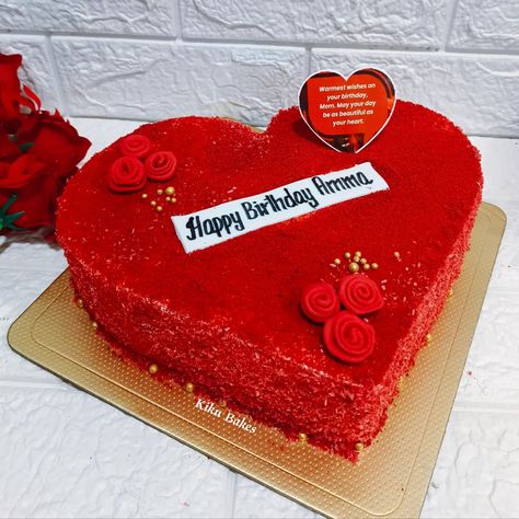 Baked with love 💕 Celebrate your mother's birthday with a decadent heart-shaped Red Velvet cake adorned with delicate fondant roses and shimmering golden sugar balls. The rich crimson hue of the cake symbolizes love and warmth, while the intricate fondant roses add an elegant touch, showcasing the beauty of her special day. Each bite offers a harmonious blend of velvety smoothness and indulgent sweetness, making every moment memorable and cherished. Whether presented as a centerpiece or serv... Velvet Cake Decoration, Heart Shape Cakes, Red Velvet Cake Decoration, Fondant Rose, Baked With Love, Heart Shaped Cakes, Mother Birthday, Velvet Cake, Red Velvet Cake