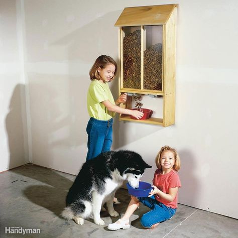 Build this bin and you can fill the dog dish with the flick of a finger and do away with that crumpled bag of dog food lying on the garage floor. This bin easily holds two 20-lb. bags of food and allows you to dispense it right into the dish. And you can store two types of food so the cat won’t get jealous. Slide open the Dog Food Dispenser, Pet Food Dispenser, Garage Update, Diy Dog Food, Pet Food Storage, Food Dog, Food Dispenser, Garage Makeover, Animal Projects