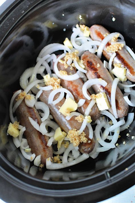 How to cook Crockpot brats with beer or broth and onions is a delicious pork meal made in one pot. Raw bratwurst in slow cooker works great. Slow Cooker Brats And Onions, Brat Bites Crock Pot, Brats Crockpot Recipes, Bratwurst Crockpot, Slow Cooker Brats, Beer Brats Crockpot, Recipes With Brats, Crockpot Bratwurst Recipes, Crockpot Brats Slow Cooker