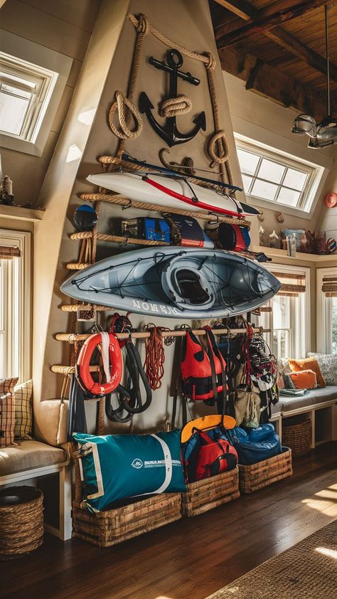 A coastal-themed room with a camping gear wall, organizing beach and camping gear with a nautical touch. Camping Gear Wall, Gear Room Organization, Outdoor Gear Storage, Camping Gear Organization, Gear Wall, Gear Room, Gear Storage, Camping Storage, Gear Organizer