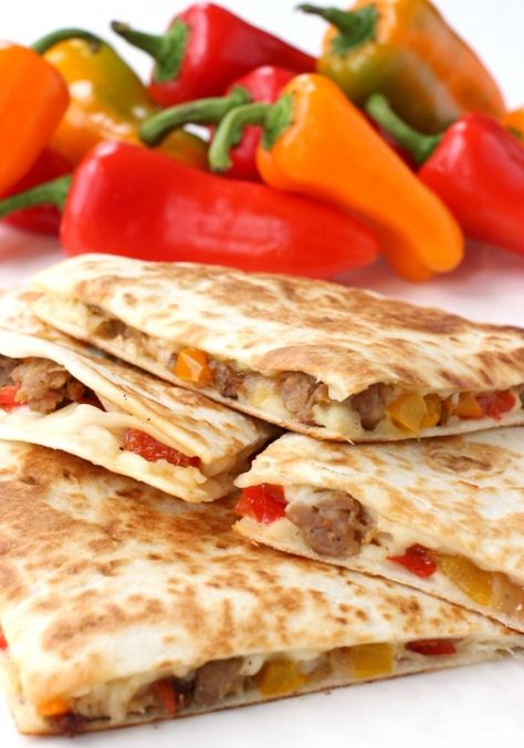 Sausage and Pepper Quesadillas are loaded with sausage, cheese and marsala wine - fun dinner idea or perfect for apps! Sausage Quesadilla, Cheeseburger Quesadillas, Sausage And Peppers Sandwich, Beef Quesadillas, Korean Beef, Quesadilla Recipes, Sausage And Peppers, Wontons, Bacon Cheeseburger