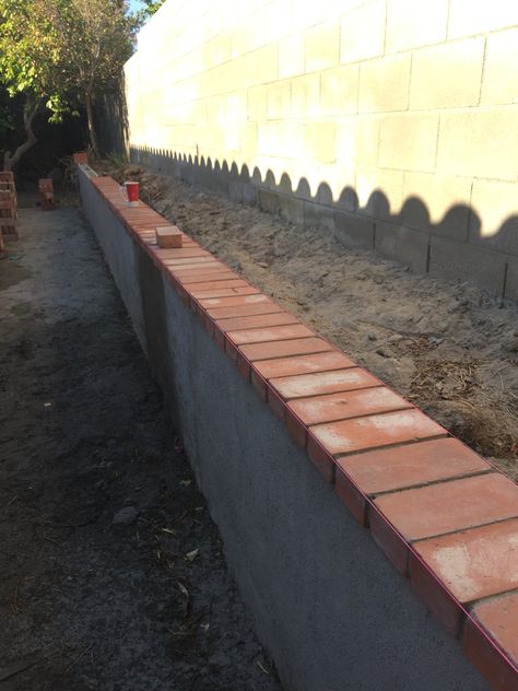 Decided to tie the new wall into the rest of the house by capping it with red brick. Poseidon Altar, Brick Border, Backyard Renovation, Brick Columns, Backyard Renovations, Red Brick House, Backyard Remodel, Raised Planter, Brick Patios