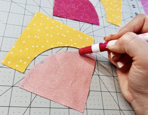 use a glue stick to baste curved fabric pieces together before sewing perfect curves. Learn how to sew curves perfectly every time with this easy quilting tutorial filled with quilting tips & tricks! A curved piecing quilting project is a great next challenge for your patchwork & quilting sewing ideas! Sewing Curved Quilt Pieces, Sewing Circles On Quilts, How To Sew Curves In Quilts, How To Sew Circles Quilt Blocks, Quilting Curved Piecing, Curved Piecing Tutorial, Sewing Curves Tutorial, Sewing Curves In Quilting, Quilts With Curved Piecing