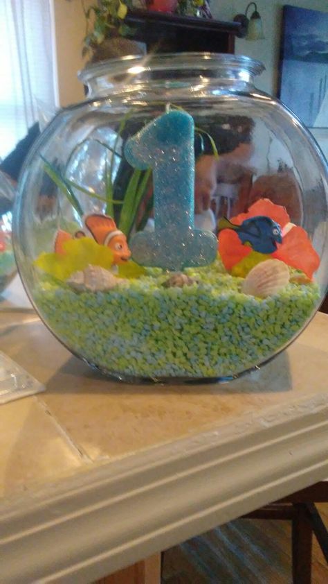 Finding dory & nemo diy fish bowl centerpiece Oh Fishally One Birthday Centerpieces, Fish Bowl Centerpiece Ideas, Fish Bowl Centerpiece Birthday, Finding Nemo Party Centerpieces, Finding Nemo Centerpieces Ideas, Nemo Centerpieces Ideas, Finding Nemo Centerpieces, Fish Bowl Centerpieces, Baby Shark Centerpiece Ideas