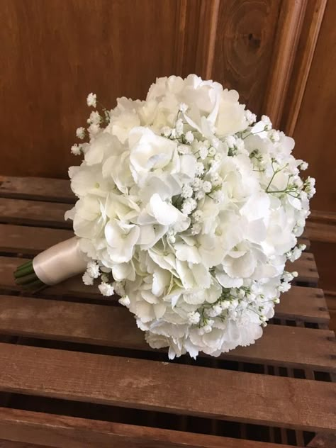 Flowergirl bouquet #flowergirl #flowergirlcrown #minibouquet #jrbridesmaid #weddingflorist #bride #bridesbouquet #bridesmaidbouquet #bridesmaids #weddingflowers #bouquet #bridalbouquet #cincinnatiflorist #bohowedding #gardenwedding #cincinnatiwedding #weddingbouquet #gardenbouquet #bohobridalbouquet #lutzflowers #hydrangea #hydrangeaandbabiesbreath Hydrangea Gypsophila Bouquet, Hortensia Bride Bouquet, White Hydrangea Bouquet With Greenery, Wedding Bouquets Hortensia, Wedding Bucay, Wedding Flowers Hortensia, Hydrangea Baby Breath Bouquet, White Roses And Hydrangeas Bouquet, Hortensia Wedding Bouquet