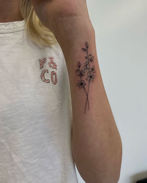 + YOU Tattoo on Instagram: “Pretty little larkspur for my girl Jennie! Grateful for clients that continue to trust me 🤟🏼 #larkspurtattoo #birthmonthflowertattoo…” North Flower Tattoo Ideas, Ute Tattoo Ideas, Larkspur Tattoo Behind Ear, Larkspur Arm Tattoo, Larkspur And Lily Tattoo, Larkspur And Narcissus Flower Tattoo, Larkspur And Narcissus Tattoo, 2 Birth Flower Tattoo, Larkspur Ankle Tattoo