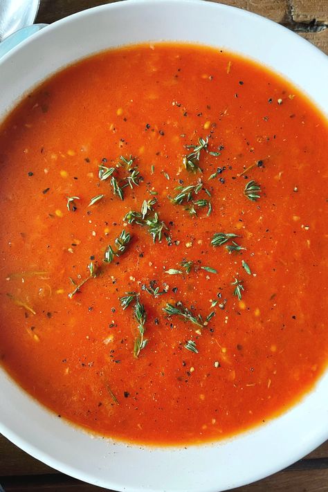 Herby, tangy and so rich and vibrant you’d never know it’s made with only a handful of pantry staples! | #soup #tomato #tomatoes #souprecipe #souprecipes #tomatorecipes #easylunchideas #healthyeating #tomatosoup Roasted Garlic Artisan Bread, Garlic Artisan Bread, Savoury Loaf, Tomato Soup Homemade, Soup And Stew, Pantry Staples, 5 Ingredient, Tomato Recipes, Artisan Bread