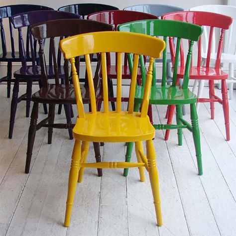 Painted Chairs: Create a rainbow in your dining room by simply painting your existing chairs in a wide variety of colors. (via Apartment Therapy) Old Chairs, Windsor Chair, Red Chair, Deco Retro, Painted Chairs, Colorful Chairs, Diy Chair, Take A Seat, Cool Chairs