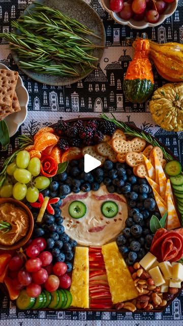 Sarah Reed on Instagram: "“When you’re scared but you still do it anyway, that’s brave.” -Coraline 

I thought a Coraline themed charcuterie board would be fun for Halloween! I used cheddar cheese spread for her face, but hummus would be another option that would work nicely. Her button eyes are made with mini cucumber slices. I used a small piping tip to punch out the holes and then used rosemary leaves for the threads. Her eyebrows and lips are made of salami, her freckles are tiny pieces of hazelnut and her hair is made of blueberries. I couldn’t leave off her dragonfly clip, so I made that with apple and pineapple which is also what I used to make her red striped shirt and yellow raincoat. Let me know if you’re going to try this!

Haunted house tea towel from @geometry.house - use SARA Cheddar Cheese Spread, Themed Charcuterie Board, Cucumber Slices, Red Striped Shirt, Mini Cucumbers, Rosemary Leaves, Yellow Raincoat, Button Eyes, Piping Tips