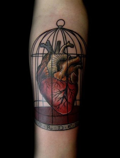 caged anatomical heart tattoo design by David Rudziński Luv Tattoo, Real Heart Tattoos, Heart In A Cage, Caged Heart, Birdcage Tattoo, Cage Tattoo, Le Tattoo, Cage Tattoos, Anatomical Heart Tattoo