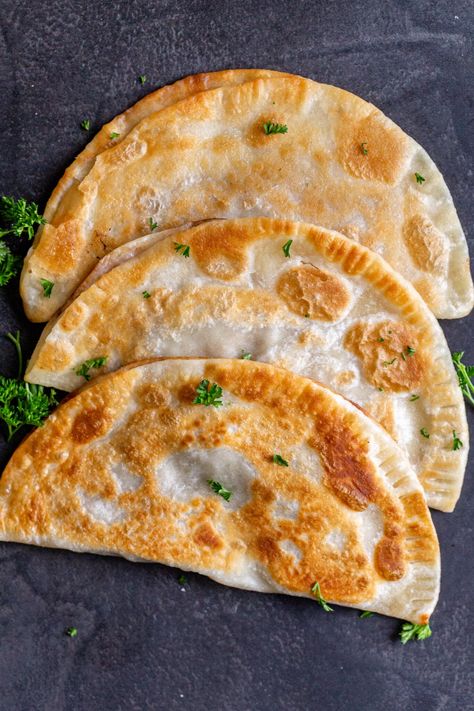 Chebureki (Russian Fried Dumplings) - Momsdish Lazy Pierogi Recipe, Easy Tortilla Recipe, Uncooked Tortillas, Homemade Dumplings Recipe, Homemade Tortilla Recipe, Russian Pastries, Pierogi Recipe, Fried Dumplings, Homemade Dumplings