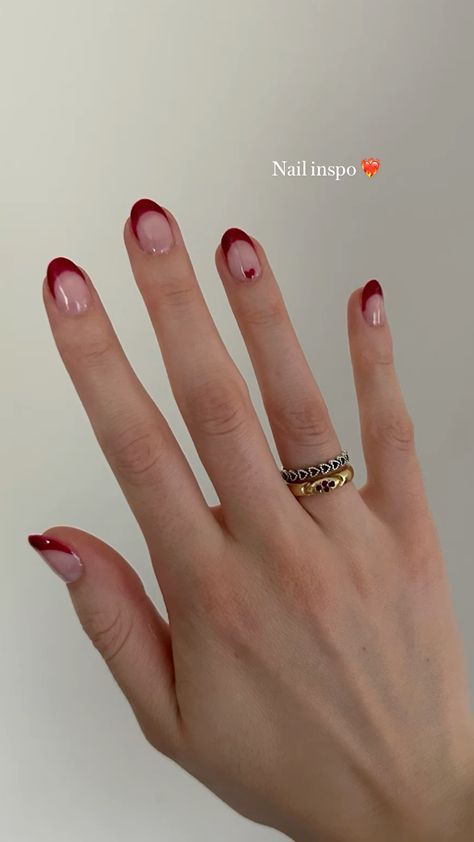 Transform your look with 30 Burgundy French Tip Nail Ideas for a Stylish 2024 Look! This luxurious shade adds a touch of sophistication to your nails. Explore various designs that inspire creativity and reflect your style! 💖✨ #BurgundyNails #FrenchTipNailArt #StylishNailIdeas #2024NailInspo #NailArtIdeas Subtle Vday Nails, Short Valentines Nails Almond, Valentines Nails Minimal, Red French Tip With Heart On Ring Finger, Gel Nail Designs Valentines Day Simple, Red With Pink Nails, Tiny Red Heart Nails, Red With Hearts Nails, Red Tie Nails