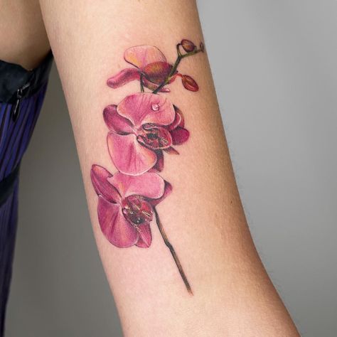 #realism #pink #tattoo #tattooartist #inked #inkedmag #tattooideas #tattooart #aesthetic #tiktok #colortattoo #microtattoo #orchid #orchidtattoo #flowertattoo For The Better Tattoo, Orchid Tattoo Ideas, Orchid Tattoo Design, Purple Orchid Tattoo, Cupcake Tattoo Designs, Orchid Tattoo Meaning, Orchid Flower Tattoos, Cupcake Tattoos, Evil Eye Tattoo