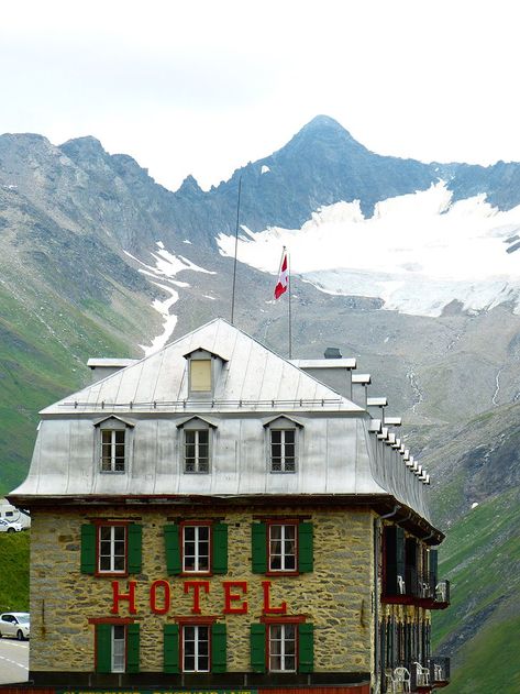 Hotel Belvédère Rhonegletscher - The Iconic Building On The Furka Pass Road Alpine Hotel, Belvedere Hotel, Building Entrance, Miles To Go, Bond Films, Iconic Buildings, Mountain Road, The James, Swiss Alps