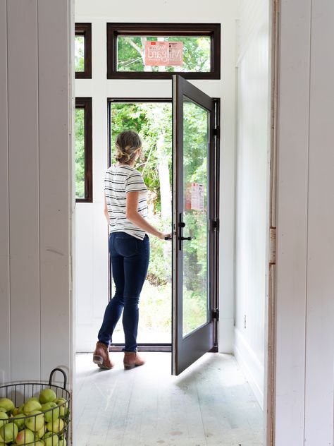 This single black patio door and matching window set was a perfect addition in this home remodel.  Check out the rest of the photos on The Grit and Polish blog. #blackfrenchdoor #patiodoorideas #blackwindows #frenchdoorideas #homeremodelideas Window Next To Door, Single Patio Door, Patio Door Installation, Fiberglass Patio Doors, Replacement Patio Doors, Hinged Patio Doors, Glass Doors Patio, Sliding Screen Doors, Exterior Doors With Glass