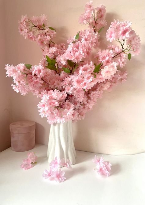 "Beautiful our signature cherry blossom bouquet in a cute packaging and a little card attached saying \" happiness blooms from within\" or \"flowers make me happy\" . Two cards to choose from. Quality cherry blossom stems. Each bouquet has 3 stems. And comes in 2 colours - white/ivory and light pink. Perfect gifting idea, Great adding to vases this spring or all year round. Approx. height 60 cm. Any questions, ask away." Sakura Flower Bouquet, Cherry Blossom Flower Bouquet, Blossom Bouquet, Sakura Bouquet, Baby Pink Flowers, Cherry Blossom Flower, Cherry Blossom Bouquet, Cherry Blossoms, Cherry Blooms