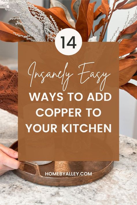 An image with a copper tray and dried magnolia leafs in a vase. The text overlay says "Insanely Easy Ways to Add Copper To Your Kitchen' Copper Outdoor Decor, Diy Copper Kitchen Decor, Copper And Silver Kitchen, Cooper Accents Kitchen, Copper Utensils Decor, Navy And Copper Kitchen Ideas, Cooper Kitchen Decor Ideas, Bronze Accents In Kitchen, Mixing Copper And Stainless Steel In Kitchen