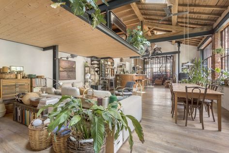 Former mechanic’s garage is reborn as a rugged industrial home in Lyon Converted Garage, Mechanical Workshop, Exposed Rafters, Garage Loft, Folding Glass Doors, Industrial Home, Wood Beam Ceiling, Clerestory Windows, Garage Conversion