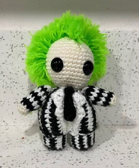 This hand made crochet original design is an Homage to my favorite Ghost with the Most! He stands 6" Tall and 5" wide. He is made of 100% acrylic yarn stuffed with Polyfiberfill and plastic safety eyes.  Get your own Personal BeetleJuice, just say his name 3X and click purchase and within a week he will appear in your mailbox.  Coming soon, Lydia and Sandworm. Followed my shop so you do not miss out.  Thank you for your interest, feel free to contact me with any questions. Beetlejuice Sandworm Crochet, Crochet Beetlejuice Hat, Crochet Beetlejuice Pattern Free, Beetlejuice Crochet Pattern Free, Beetlejuice Crochet Pattern, Beetle Juice Crochet, Crochet Beetlejuice, Beetlejuice Crochet, Beetlejuice Room