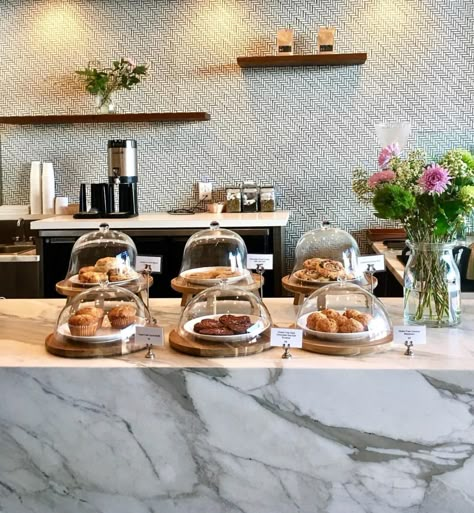 Pastries Coffee Shop, Cafe Counter Ideas Coffee Shop, Coffee Shop Cake Display Ideas, Coffee Shop Counter Ideas Bakery Display, Pastry Display Ideas Coffee Shop, Pastry Case Coffee Shop, Coffee Shop Pastry Display, Coffee Shop Food Display, Scandinavian Interior Coffee Shop