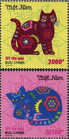 While most of Asia is celebrating the Year of the Rabbit, they’re celebrating the Year of the Cat in Vietnam. The New Year celebration began on Feb. 3 and will run until Feb. 15. How the cat came to replace the rabbit in Vietnam’s lunar zodiac, which originated in China, remains unclear. But the founding … Vietnamese Year Of The Cat, Year Of The Cat, Postage Stamp Design, Cat Stamp, Lunar Year, Beautiful Range, Postage Stamp Art, Image Chat, Stamp Collection