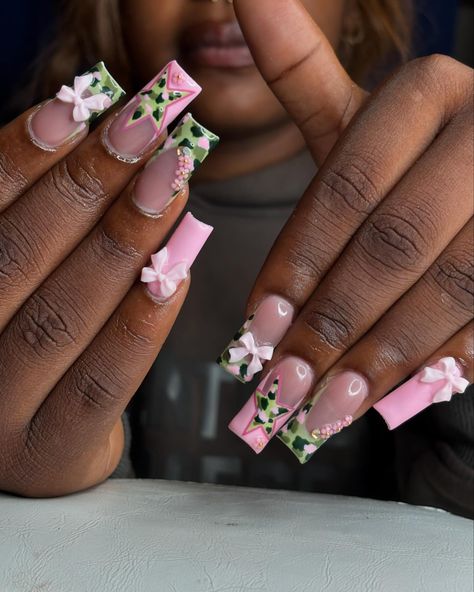 pink camo nails 💚🩷 - if you’re seeing this dm @nails.bydaya_ to book an appt 🤍 - - - - - - - - - - - - #pinknails #girlynails #coquettenails #pinkbow #camonails #camonaildesign #pinkcamo #pinkcamonails #camostar #pinknaildesign #fyp #gelxnails #gelxnailtech #bptnailtech #ctnailtech #ctnails #bptnails #bridgeportnails #bridgeportct #bridgeportnailtech #bridgeportctnailtech #bridgeportctnails #beginner #notaprofessional #justforfun #nailart #naildesigns #nailinspo #nails.bydaya_ #nailsbydaya Camo Print Nails, Camo French Tip Nails, Pink Camo Nails, Camo Nail Designs, Camouflage Nails, Camo Nails, Camo And Pink, Pink Nail Designs, Pink Camo