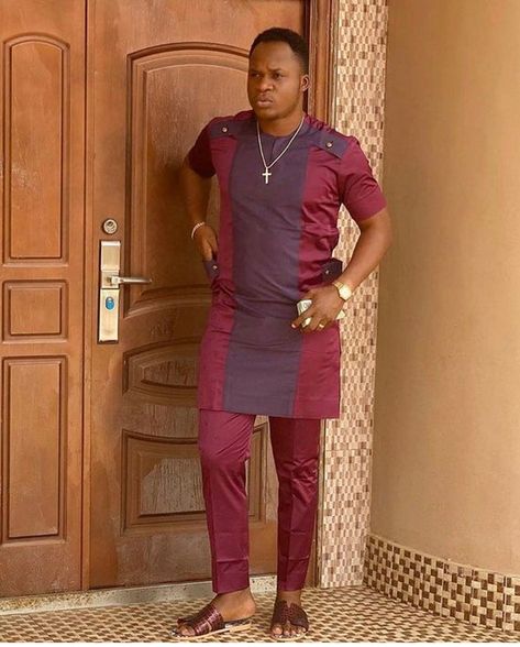 This kaftan for men is a must have for any African man who wants to impress. With its history deeply rooted in the cultures of the indigenous Yoruba people of Nigeria, this formal outfit has always been worn with prestige and perceived affluence. The set includes a kaftan and trouser with the Chitenge Outfits, Latest African Wear For Men, African Wear For Men, Dashiki For Men, Clothing Embroidery, Native Wears, Nigerian Men Fashion, African Dresses Men, African Clothing For Men