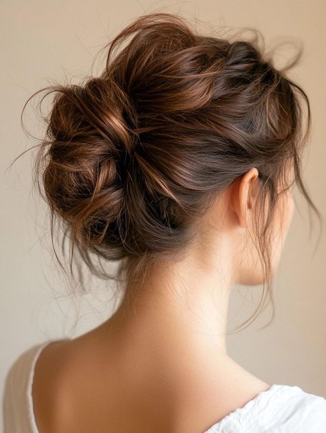 Unlock the potential of your medium-length locks with 34 stunning messy bun ideas. These versatile updos add instant style to any outfit. Master the art of creating texture and volume for a perfectly undone look. From romantic loose buns to sleek twisted knots, find the ideal style for every occasion. Elevate your hair game with these effortlessly chic hairstyles. Hair Up Medium Length, Bun With Medium Length Hair, Medium Hair Messy Bun, Bun Hairstyles For Medium Length Hair, Hairstyles For Medium Length Hair Updo, Messy Bun For Medium Length Hair, Messy Bun Medium Length Hair, Loose Hair Bun, Low Messy Bun Wedding Hair