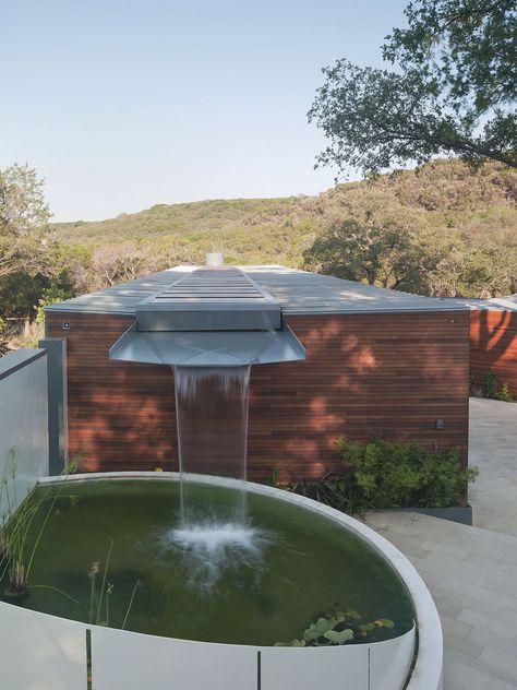 https://flic.kr/p/9WcyQX | G.H. Residence  A0698871 | G. H. Residence was conceived less as a house, but more as an extension and outgrowth of the limestone and aquifers of the Central Texas geography. The roof structure is configured so as to create a natural basin for the collection of rainwater, not unlike the vernal pools found in the outcroppings of Enchanted Rock. These basins harness additional natural flows through the use of photovoltaic and solar hot-water panels. The water, electr... Rainwater Collection, Water From Air, Creek House, Water Collection, Rainwater Harvesting, Rain Barrel, Rain Water Collection, Earthship, Pool Design