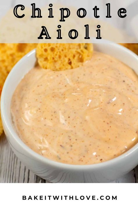 Chipotle aioli is an incredibly tasty condiment that is creamy, bold, and bursting with smoky and spicy flavors! Enjoy it as a dipping sauce, a spread for burgers or sandwiches, or even a topping for tacos! This versatile aioli can be used in so many different ways! BakeItWithLove.com Spanish Dipping Sauce, Jalapeno Aioli Recipes, Aoli Recipe Aioli Sauce For Tacos, Aioli Recipe For Burgers, Chipotle Aoli Recipe, Empanada Dipping Sauce, Spicy Aioli Sauce, Chipotle Aioli Sauce, Chipotle Aioli Recipe