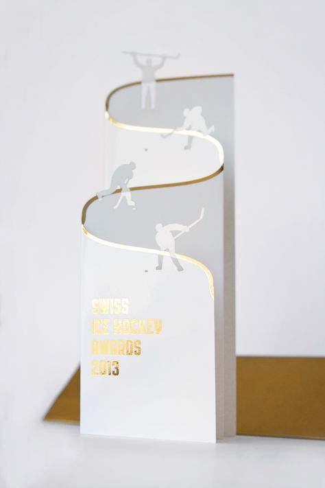 Swiss Ice Hockey Awards 2012 / 2013 on Behance Paper Folding Designs, Hockey Awards, Brochure Design Creative, Luxury Packaging Design, Dm Design, Graphic Design Brochure, Trophy Design, Leaflet Design, Design Brochure