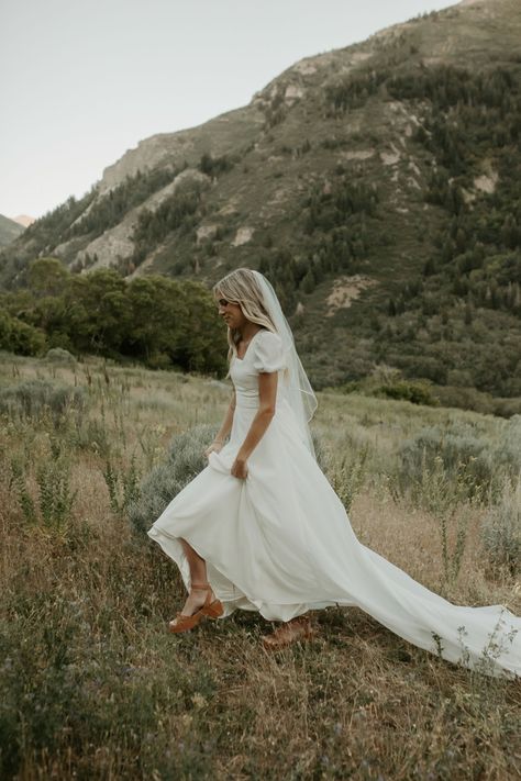 Minimalist Puff Sleeve Wedding Gown, Silk Puff Sleeve Wedding Dress, Ruffled Sleeve Wedding Dress, Lightweight Flowy Wedding Dress, Small Puff Sleeve Wedding Dress, Modest Short Sleeve Wedding Dresses, Short Sleeve Puff Wedding Dress, Modest Wedding Dresses Aesthetic, Simple Modest Wedding Dresses Vintage