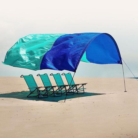 The Shibumi Shade is a Wind Powered Beach Canopy That Uses The Wind to Provide Shade Yellow Beach Umbrella, Beach Canopy, Beach Shade, Wind Power, Beach Umbrella, Ocean Breeze, Umbrella, Shades