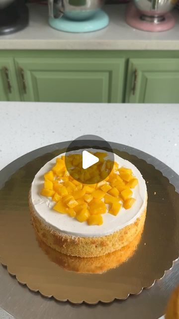 Ankita Dutta Dubey | CAKE ARTIST on Instagram: "Mango cake assembly!   Now that mango season is almost over, I am going to really miss this because it my favorite flavor on the menu ☺️  Assembling my most loved mango chiffon. The cake does require gentle soaking. After the crumbcoat, I refrigerated the cake for about 30 minutes before I put on the second coat.   I’ve paired the cake with vanilla Swiss meringue buttercream and fresh mango.   #mangocake #mangocakes #mangodessert #chiffoncake #chiffoncakes #cakereels #cakereel #cakereelsofinstagram #cakedecorating #cakeflavours #cakesgram #cakeinspiration #cakeinstagram #naanbaibakes #naanbaicakes #naanbai." Cake Assembly, Mango Dessert, Mango Cake, Cake Artist, Meringue Buttercream, Swiss Meringue, Swiss Meringue Buttercream, Mango Tops, Chiffon Cake