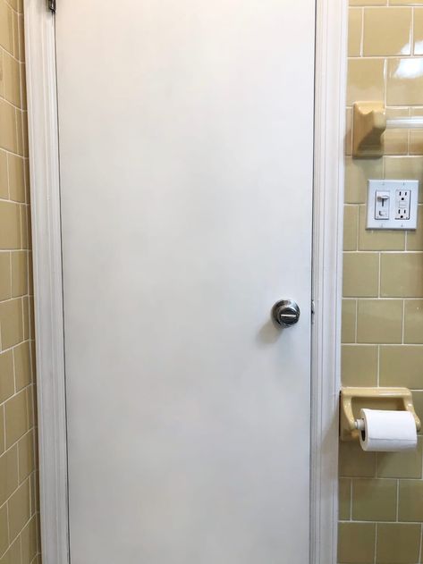 White painted door in a bathroom rental redo Shower Door Contact Paper, Paint Bathroom Door, Shower Door Adhesive, Replace Shower Curtain With Door, Rv Bathroom Door Makeover, Removong Shower Door, Pvc Doors Bathroom, Bathroom Closet Door Ideas, How To Paint Behind A Toilet