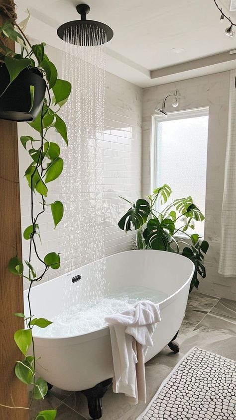 Serene bathroom oasis with a freestanding bathtub, bubbles, green plants, and rain showerhead - ideal for relaxation and tranquility at home Standalone Bathtub Decor, Bathroom Greenery, Bathroom With Plants, Stand Alone Bath Tub, Home Retreat, Relaxing Home, Stand Alone Tub, Serene Bathroom, Bathroom Oasis