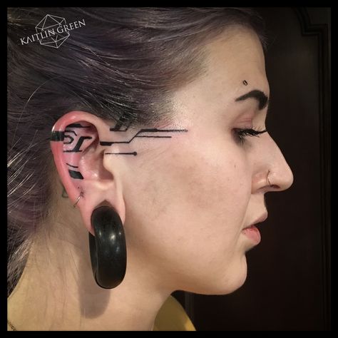 Microchip circuit linework futuristic line ear tattoo for women by Kaitlin Green, Denver Colorado tattoo artist. Delicate circuitry cyberpunk black tattoo. Line Ear Tattoo, Circuit Tattoo, Robot Tattoo, Tech Tattoo, Colorado Tattoo, Cyberpunk Tattoo, Green Tattoos, Gaming Tattoo, Tattoo Magazines