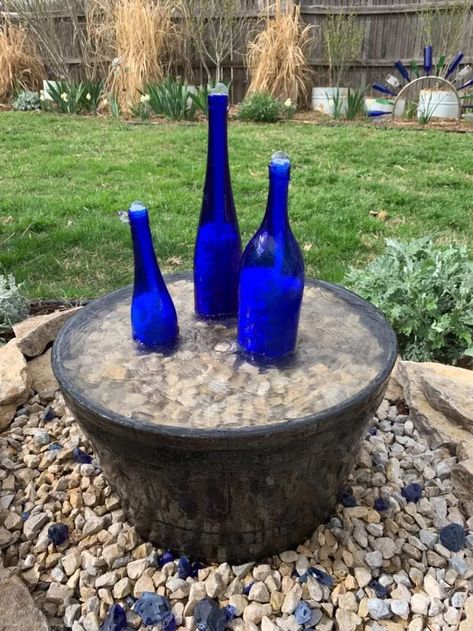 Water Fountain From Wine Bottles | Hometalk Outdoor Water Fountain Ideas, Wine Bottle Fountain, Water Fountain Ideas, Homemade Water Fountains, Small Water Fountain, Concrete Fountains, Fountain Ideas, Old Wine Bottles, Solar Water Fountain