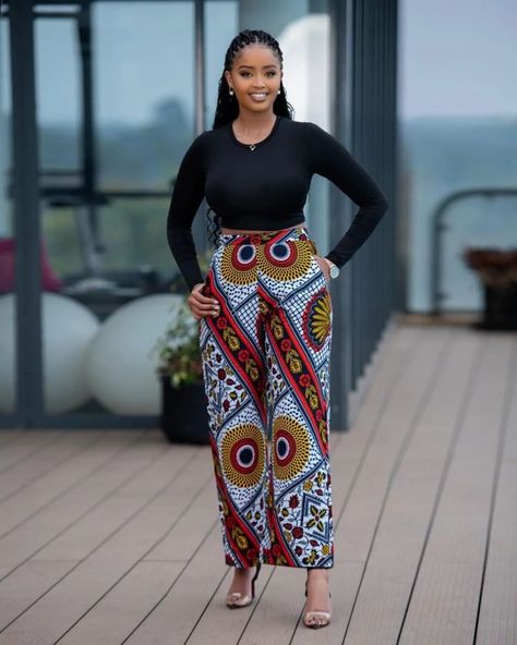 Ankara Styles 2022: Beautiful Trouser Outfit for Ladies. - Ladeey Trouser And Top For Ladies, Outfit For Ladies, Ankara Pants, Ankara Trousers, Fashion Trousers, Short African Dresses, Bell Pants, Ankara Fashion, African Dresses Modern