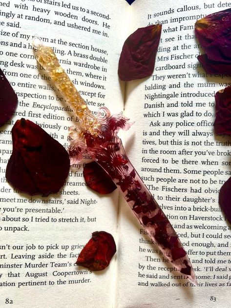 Book Things To Buy, Dagger Bookmark, Pretty Dagger, Pretty Bookmarks, Rose Bookmark, Fantasy Dagger, Rose And Dagger, Christmas Bookmark, Knife Aesthetic