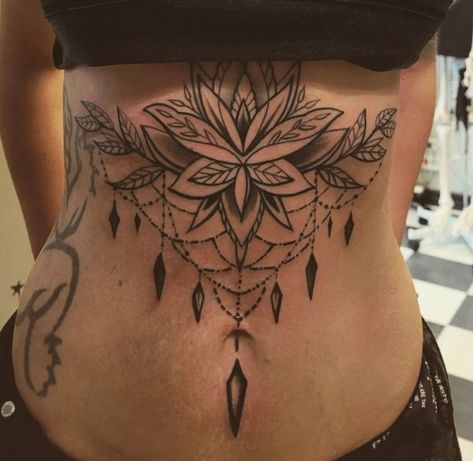 Stylish Full Stomach Tattoos Women’s Stomach Tattoo Ideas, Ladies Stomach Tattoos, Women Stomach Tattoos Cover Up, Stomach Tattoos Women Cover Scars, Center Stomach Tattoos, Vertical Stomach Scar Tattoo Cover Up, Stretchmark Cover Tattoos, Stomach Tattoos Words, Women Stomach Tattoos Ideas