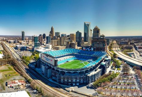 North Carolina, Charlotte, Charlotte Skyline and Bank of America Stadium. North Carolina Charlotte, Charlotte Skyline, Bank Of America Stadium, Nfl Stadiums, Football Stadium, Football Stadiums, Bank Of America, Carolina Panthers, Charlotte Nc