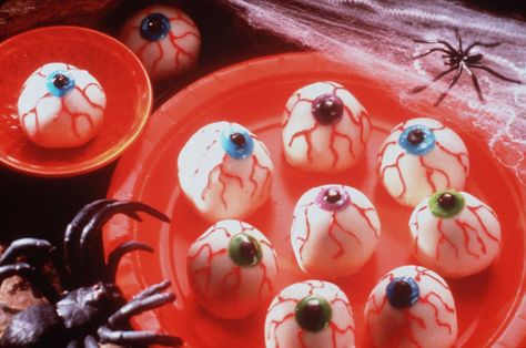 What’s more terrifying than a dessert that stares back as you bite down? These edible eyeballs are really just brownie bites in disguise, but are a sure attention getter on any Halloween spread. Makes 16 servings 1 package fudge brownie mix 1 cup sweetened dried cranberries 2 cups white chocolate chips or morsels, melted Tubes of colored writing gel Instructions: Prepare brownies according to package directions. Trim crisp edges from the brownie while warm (eat or discard them). Crumble remainin Dried Cranberries Recipes, Halloween Deserts, Ocean Spray Cranberry, Cranberry Dessert, The Swap, Ocean Spray, Cranberry Recipes, Fudge Brownies, Brownie Mix