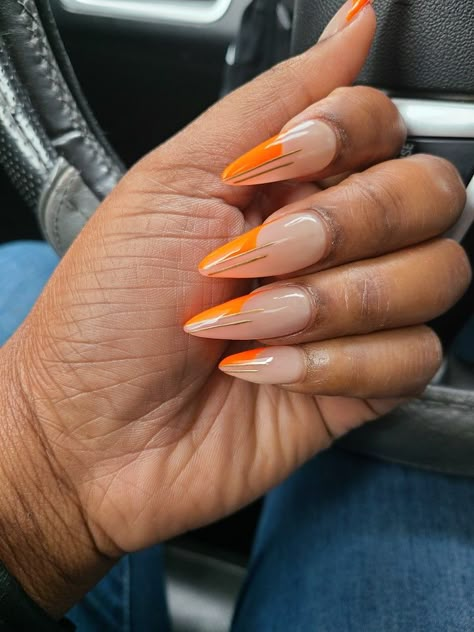 Almond nails, acrylic nails, orange minimalist nails Orange Nail Designs Almond Shape, Orange Minimalist Nails, Orange Double French Tip Nails, Orange Outline Nails, Orange Nail Designs Almond, Orange Almond Nails Designs, Orange Nails Almond Shape, Burnt Orange Almond Nails, Orange Almond Acrylic Nails